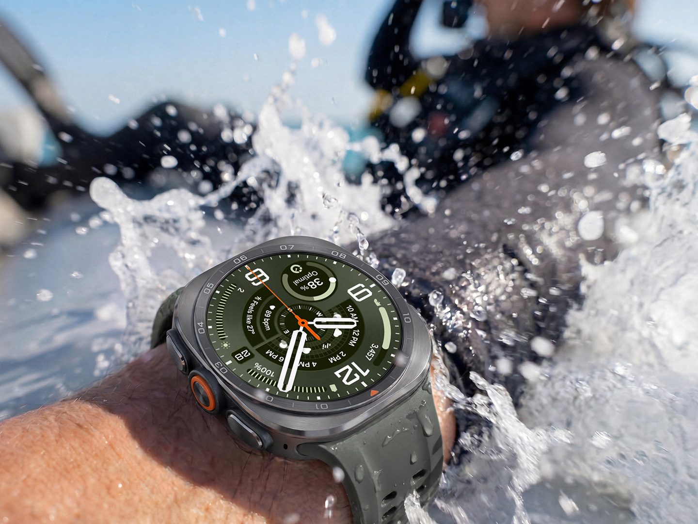 Close up of a Galaxy Watch Ultra2 on an ocean diver's wrist in water, indicating durability.