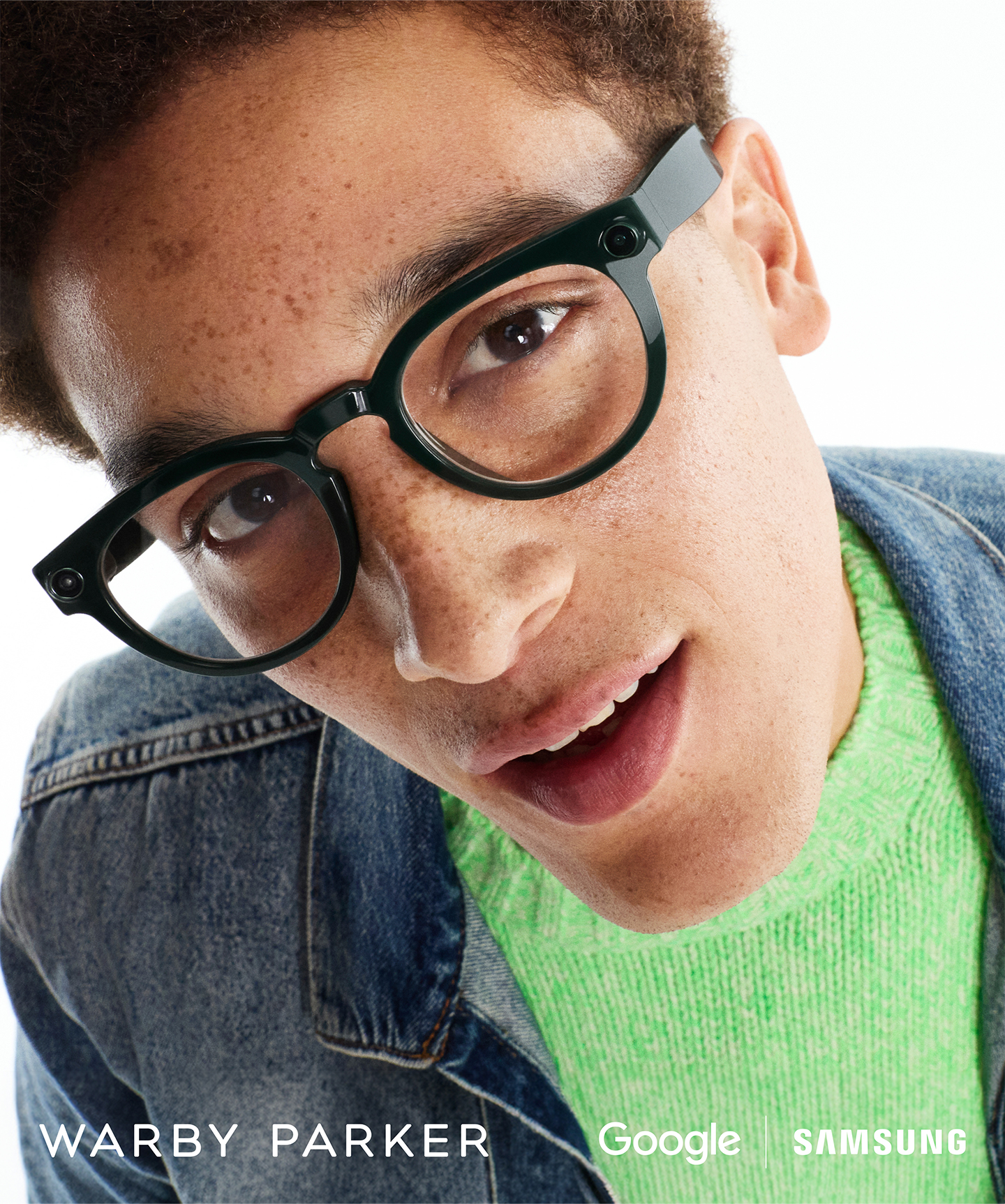 Close-up of a man wearing Warby Parker’s design, featuring refined, rounded lenses. 
