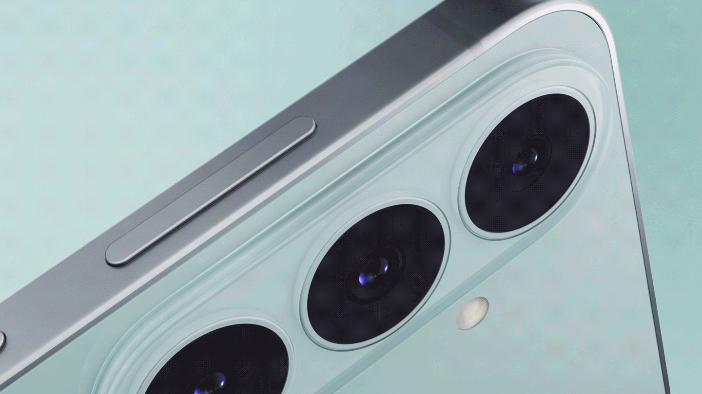 The back of a Galaxy S26 FE in Pistachio is shown before the front of another Galaxy S26 FE in Pistachio appears above it, displaying an image of a woman in sunglasses.