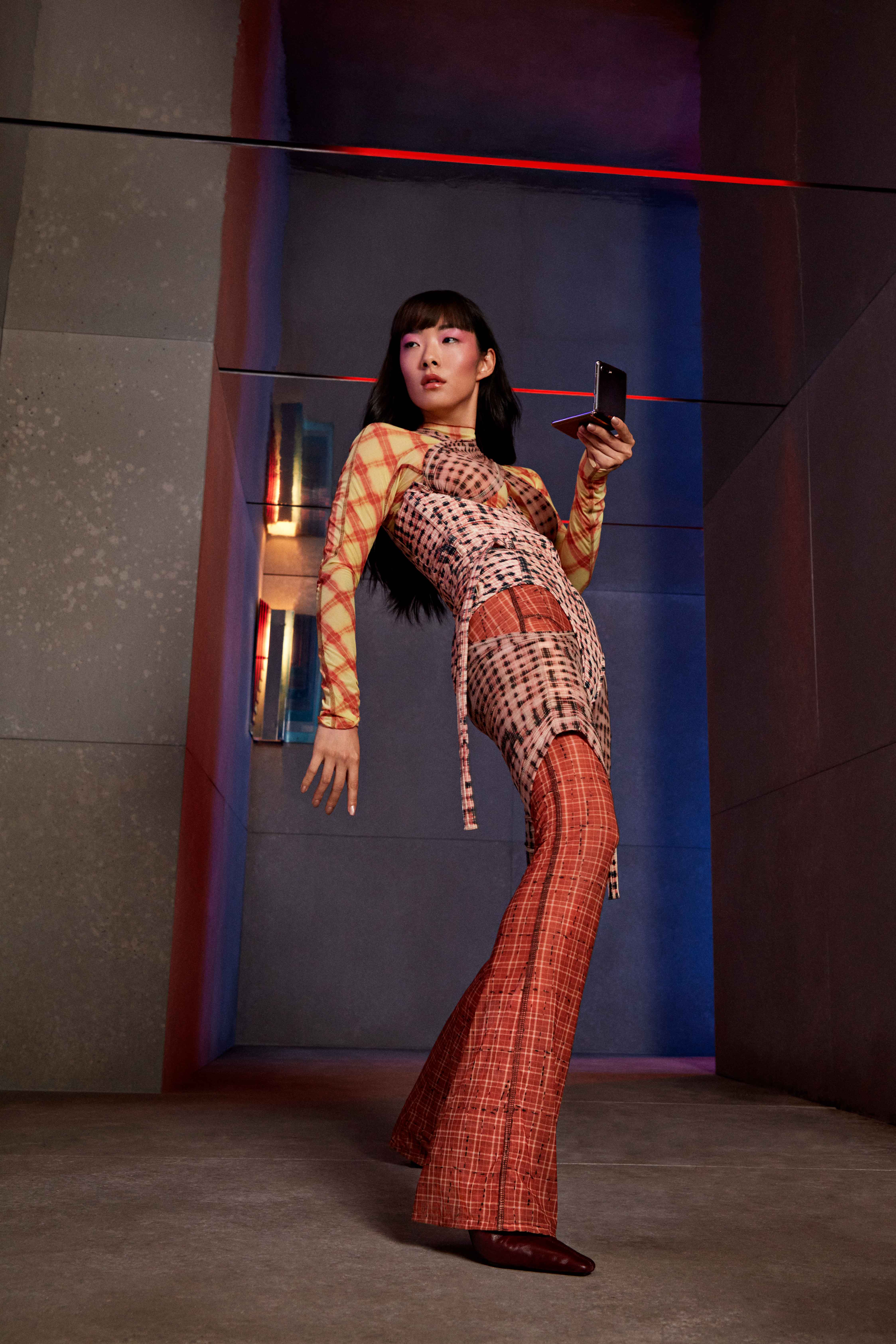 Meet the stars behind Samsung&rsquo;s Greatest Gift film - Rina Sawayama holding the galaxy z flip