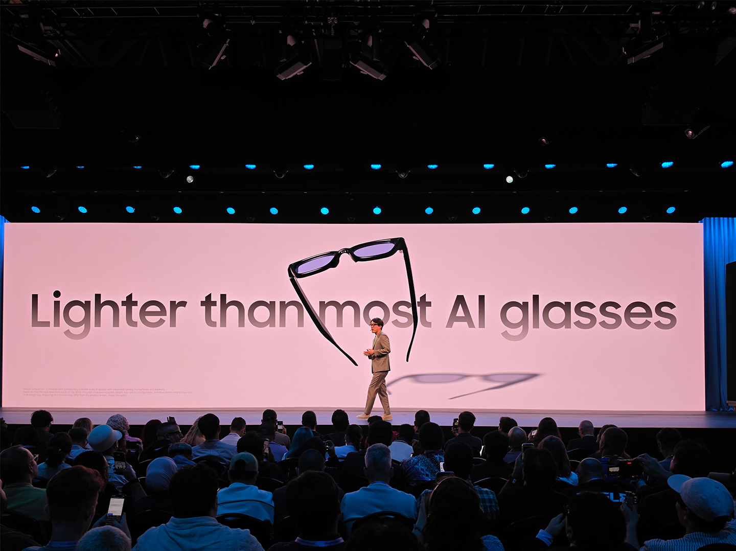 A Samsung executive on stage at Galaxy Unpacked July 2026 in London introduces the company’s new intelligent eyewear in front of a packed crowd. 
